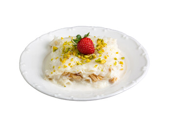 Close-up walnut gullac dessert. Traditional Ramadan dessert. Middle Eastern desserts.