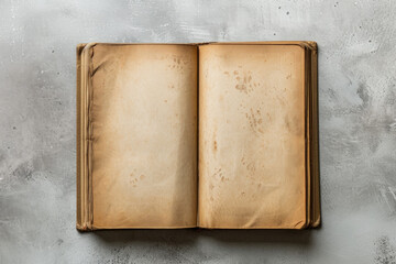 Open old book with blank stained pages isolated on a solid background, copy space