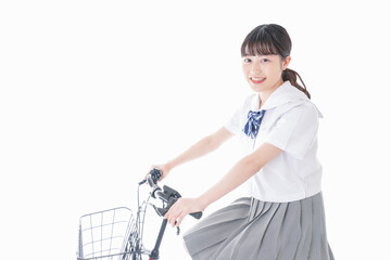 自転車通学をする若い女子学生