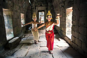 Two khmer apsara dancers inside Angkor Wat temple, Cambodia