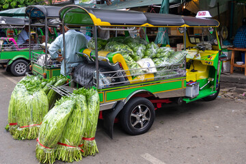 Tuk tuk filled with vegetables