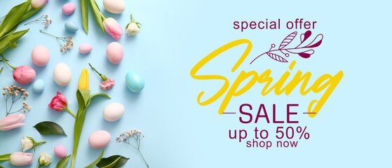 Painted Easter eggs and beautiful flowers on blue background. Spring Sale