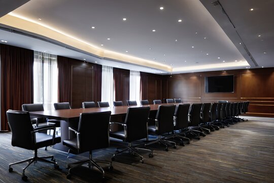 View of meeting table in empty boardroom