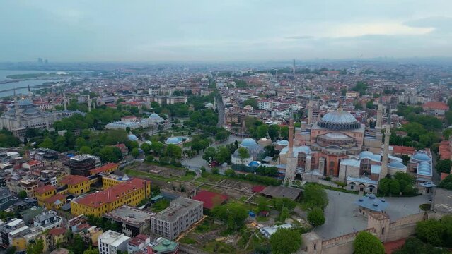 Blue Mosque and Hagia Sophia aerial view at Sultan Ahmet at Park in Sultanahmet district in historic city of Istanbul, Turkey. Historic Areas of Istanbul is a UNESCO World Heritage Site. 