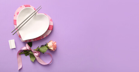 Beautiful table setting for Valentine's Day dinner on lilac background with space for text