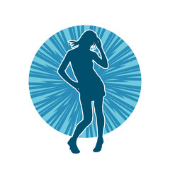 Silhouette of a slim female in dance pose. Silhouette of a woman dancing.