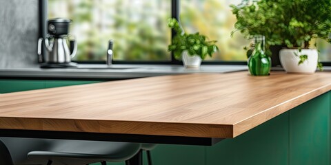 Modern green kitchen bench with a wooden table in the background