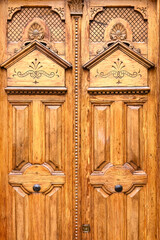 Ancient wooden door, front view