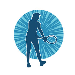 Silhouette of a female tennis player in action pose. Silhouette of a woman playing tennis sport with racket.