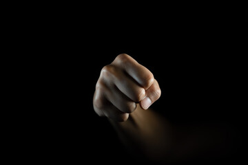 fist, Hand gesture. man clenched fist, ready to punch, isolated on black, close-up, copy space