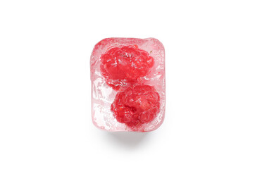 Frozen raspberries in ice cube on white background