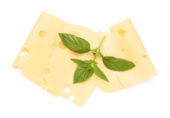 Tasty cheese slices and basil leaves on white background