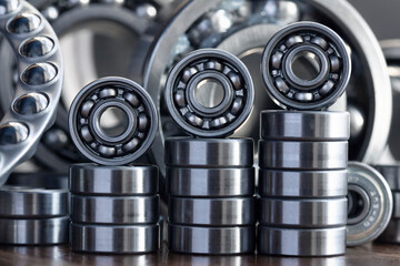 A set of metal silver radial ball bearings close-up for mechanical engineering and machine tools...