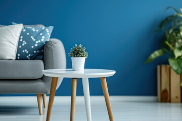 Modern living room interior with comfortable sofa and minimalist coffee table. Home decor and design.