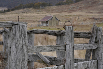 Old wooden fence and homestead
