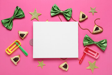 Blank card with hamantaschen cookies, rattles and decor for Purim holiday on pink background