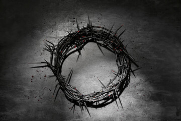 Crown of thorns with blood on grey grunge background