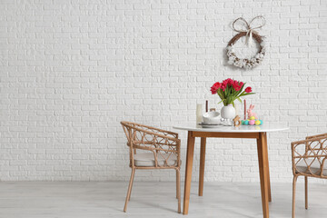 Interior of dining room with Easter wreath and table