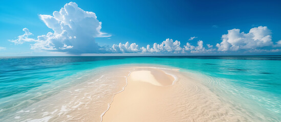 endless turquoise sea scape with white sand beach and blue sky. Copy space wide banner
