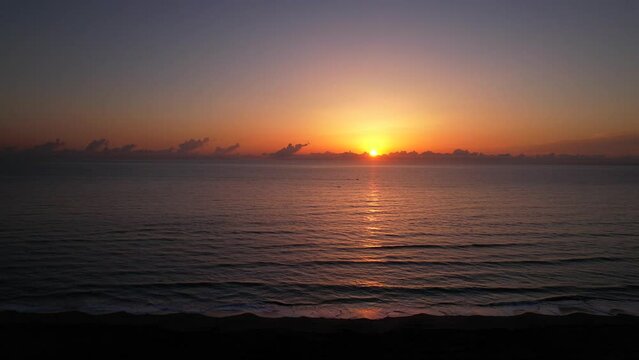 ocean sunrise over beach aerial asmr waves rolling in