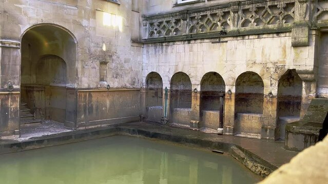 Steam rising from the naturally heated Roman springs at Bath England