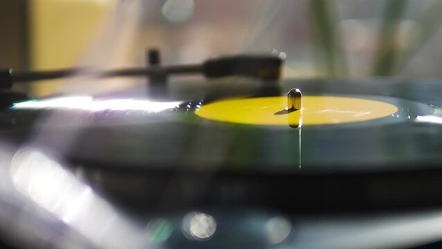 Yellow Vinyl Spinning on a Modern Record Player
