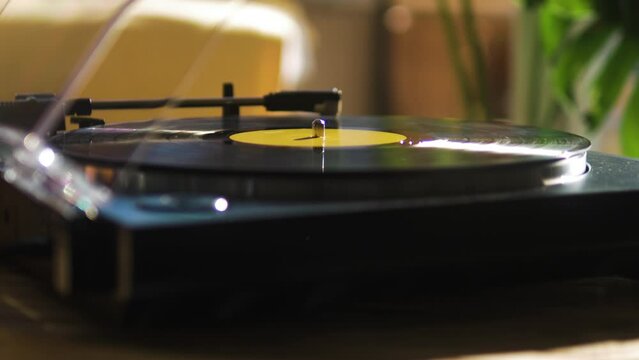 Modern Record Player Playing a Vinyl at Home in the Morning
