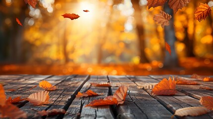 Naklejka na ściany i meble Fallen autumn leaves on wooden table. Something placement mockup design autumn background.