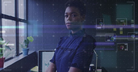 Image of data processing over african american businesswoman in office