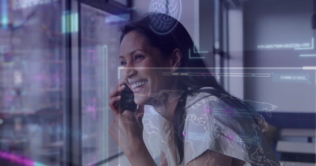 Image of financial data processing over biracial businesswoman using smartphone