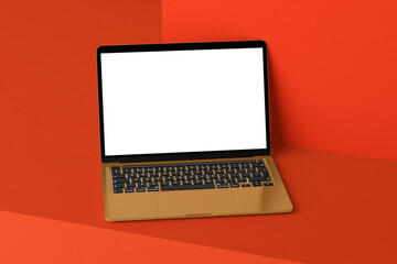 laptop with blank screen and red background