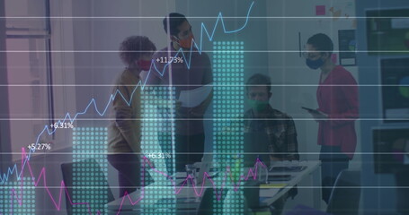 Image of statistics recording over team of colleagues in office wearing face mask