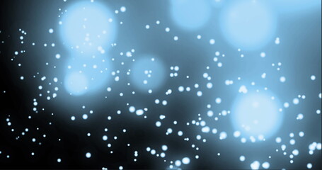 Image of multiple spotlights floating on glowing blue background