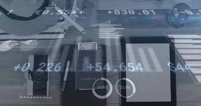 Image of financial data processing over electronic devices and suitcase with travel items - Powered by Adobe