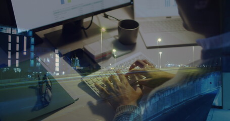 Image of biracial businessman using computer over data processing and cityscape