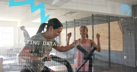 Image of graph processing data over caucasian woman on elliptical cheered by friends at gym