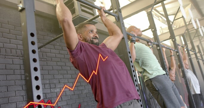 Fototapeta Image of graph processing data over diverse group doing pull ups cross training at gym