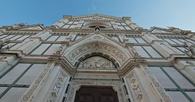 Basilica of Santa Croce, Florence, Italy. Beautiful architecture of the facade of the cathedral in the historical center of the tourist city. High quality 4k footage