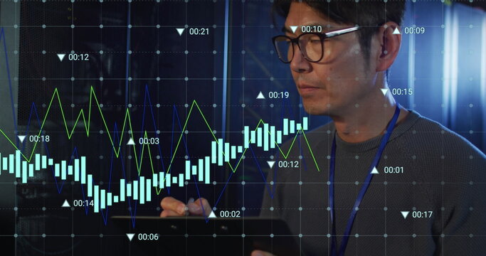 Image of data processing over biracial man using tablet in server room