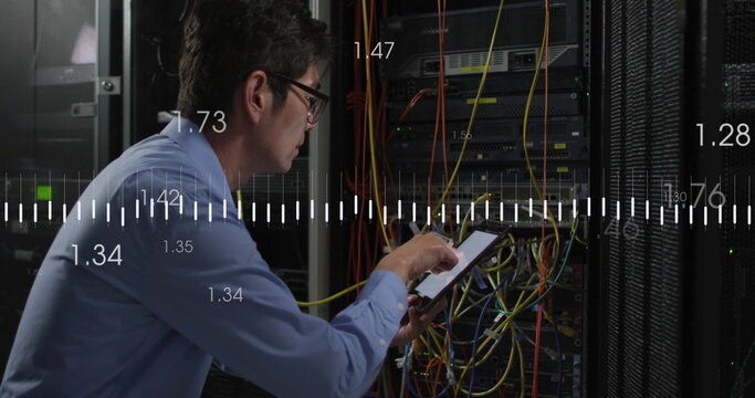 Image of data processing over biracial man using tablet in server room