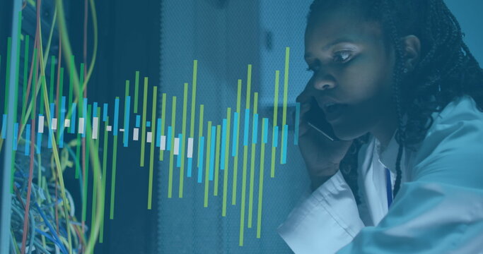 Image of data processing over african american woman using phone in server room