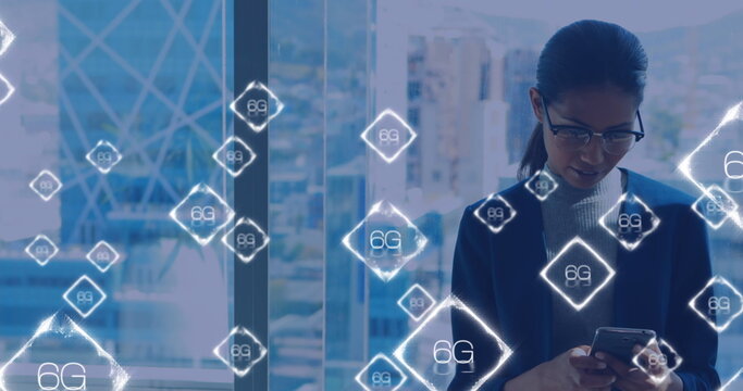 Image of 6g texts over biracial woman using smartphone - Powered by Adobe