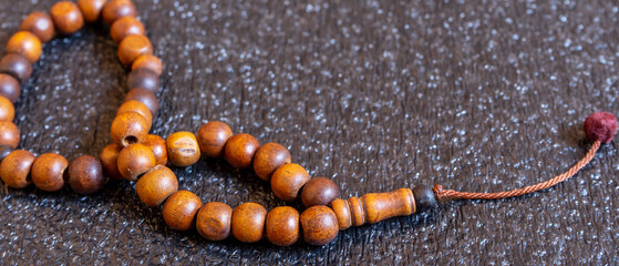 Wooden prayer beads for religion concept