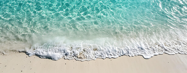 Fototapeta na wymiar Beautiful tropical beach along the coastline with waves, Aerial drone view of sandy beach.