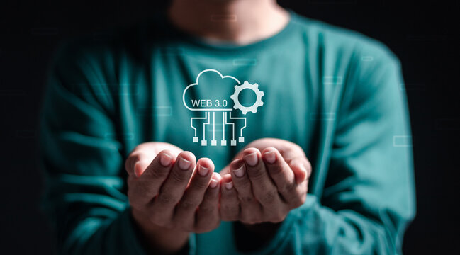 Web 3.0 concept. Businessman hold virtual web 3.0 icon for new technology of the internet. Data analysis is intelligent, Content creation and data storage.