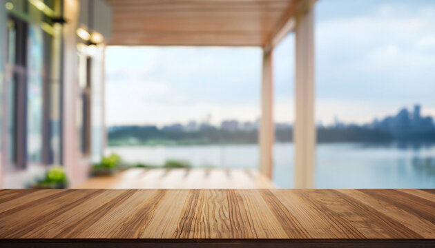 Wooden table top at the blurred background interior. sunway lake view house model