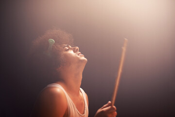 Man, drummer and musician in performance at rock concert, music festival on stage and talent....
