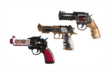 three toy guns isolated on white background