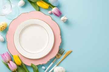 Festive Dining Scene: Overhead photo capturing an Easter-themed table setting with plate, cutlery,...