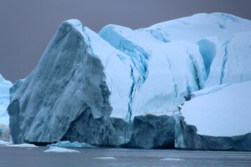 Close-up of an iceberg in Ilulissat Icefjord with dramatic sky in Disko Bay, Greenland, Denmark